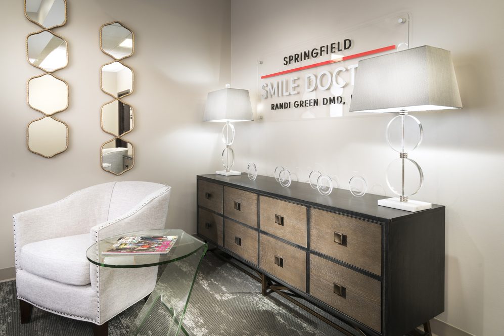Waiting area seating and cabinet with Springfield Smile Doctor signage