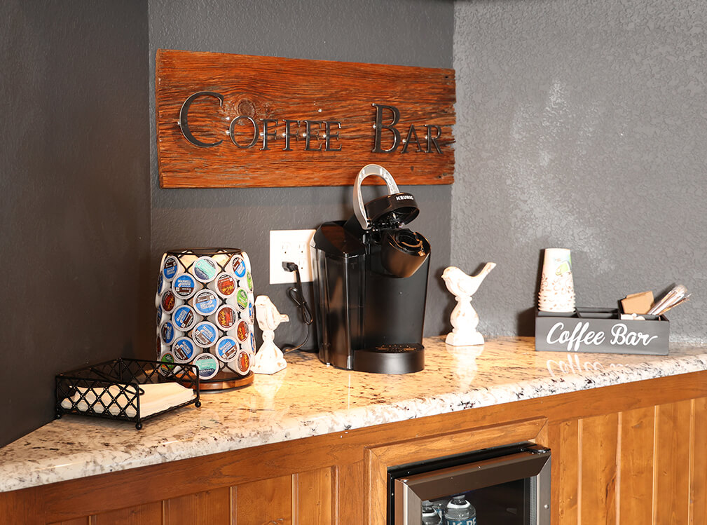 Coffee bar with Keurig machine and K-cups in Magnolia Dental waiting area