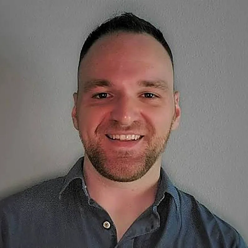 Headshot of a smiling staff member at Christopher Cannady dental practice