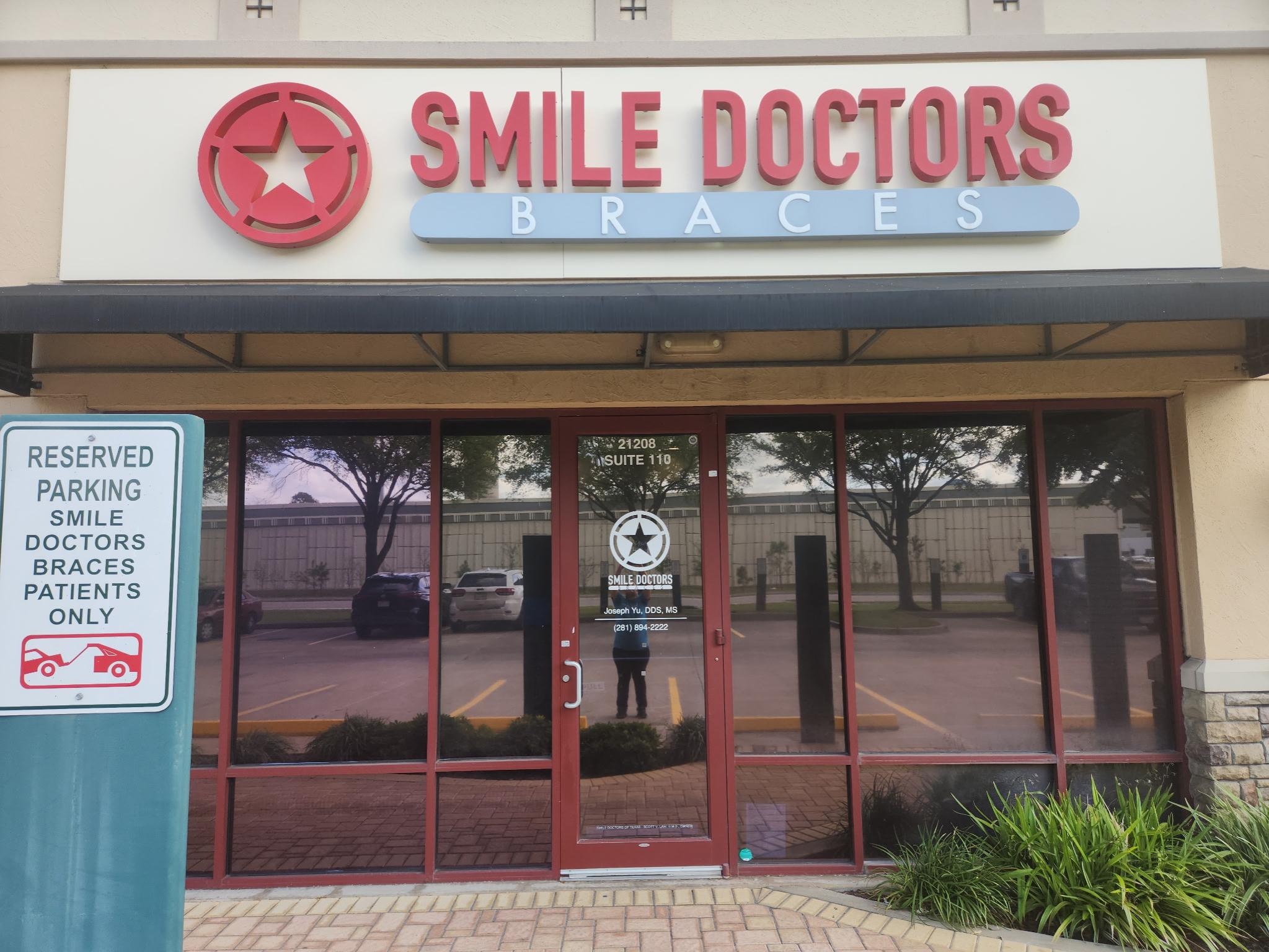 Storefront exterior with Smile Doctors Braces signage at the Cypress, TX practice location