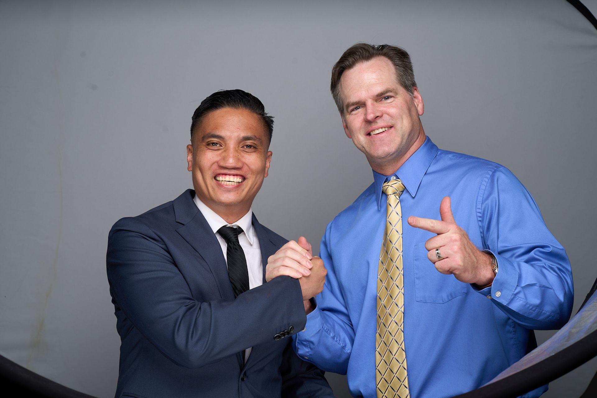 Dentists Dr. Carson and Dr. Acasio of Carson & Acasio Dentistry in Oxnard, CA posing together