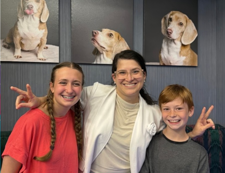 Dr. Maryam Rezaie with two young braces patients at Vibrant Orthodontics, Tallahassee FL