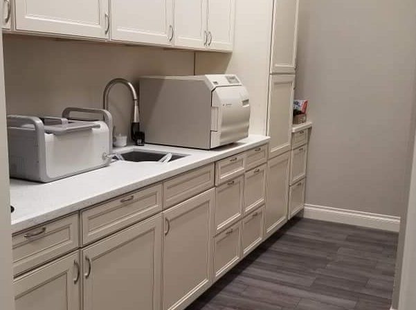 Sterilization area with cabinetry and equipment at Your Smile Designer Dental Menifee & Orthodontics