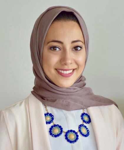 Portrait of a smiling team member in a hijab at Tysons West Orthodontics & Children's Dentistry