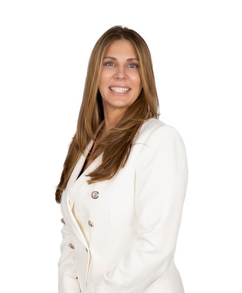 Portrait of a smiling woman in a white blazer against a white background