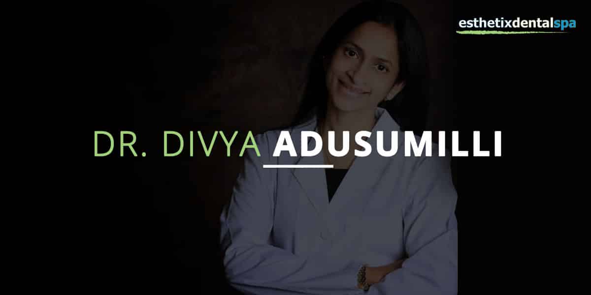 Dr. Divya Adusumilli, dentist at Esthetix Dental Spa in New York, in a white coat