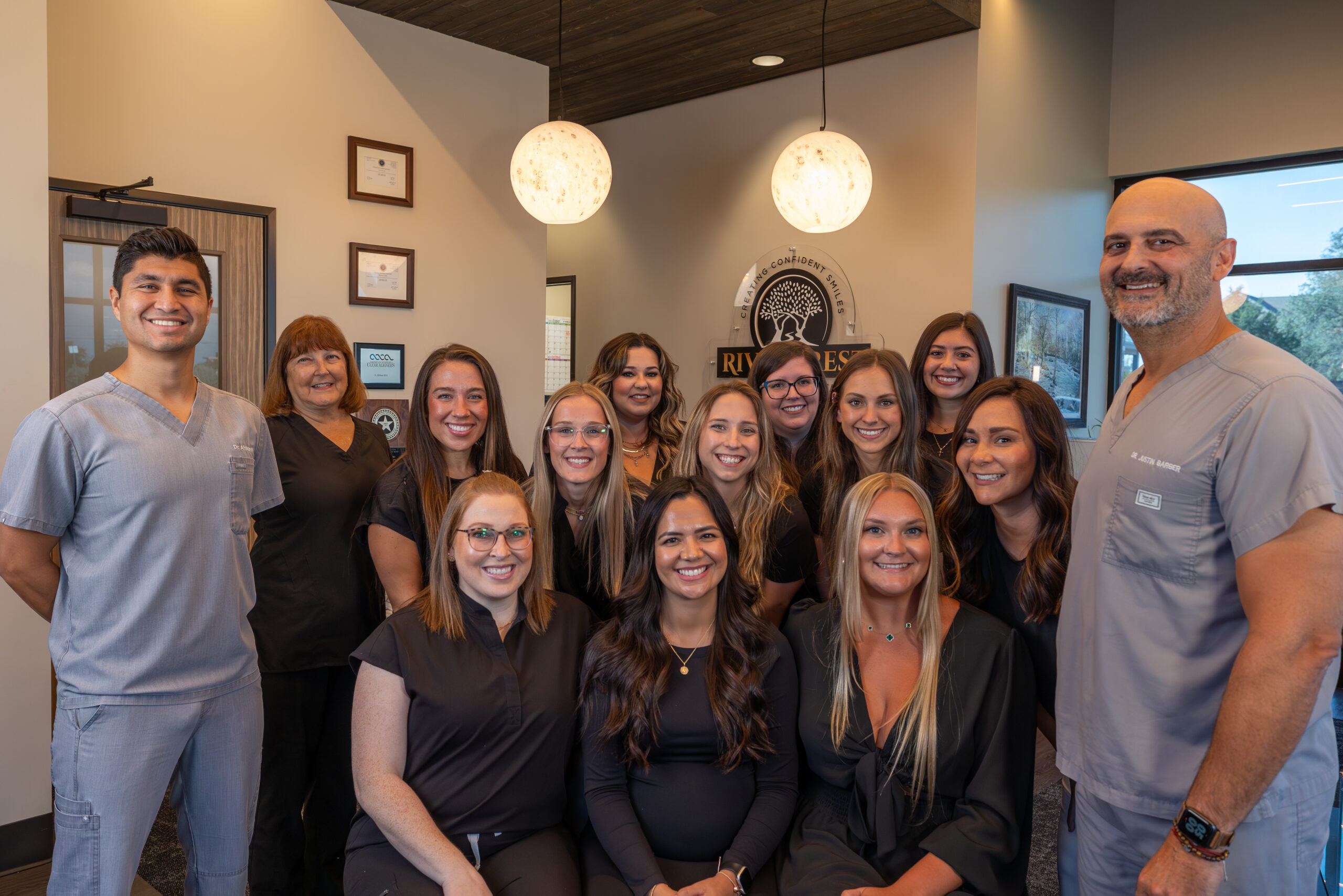 Team photo of dentists and staff at Rivercrest Family Dental in New Braunfels, TX